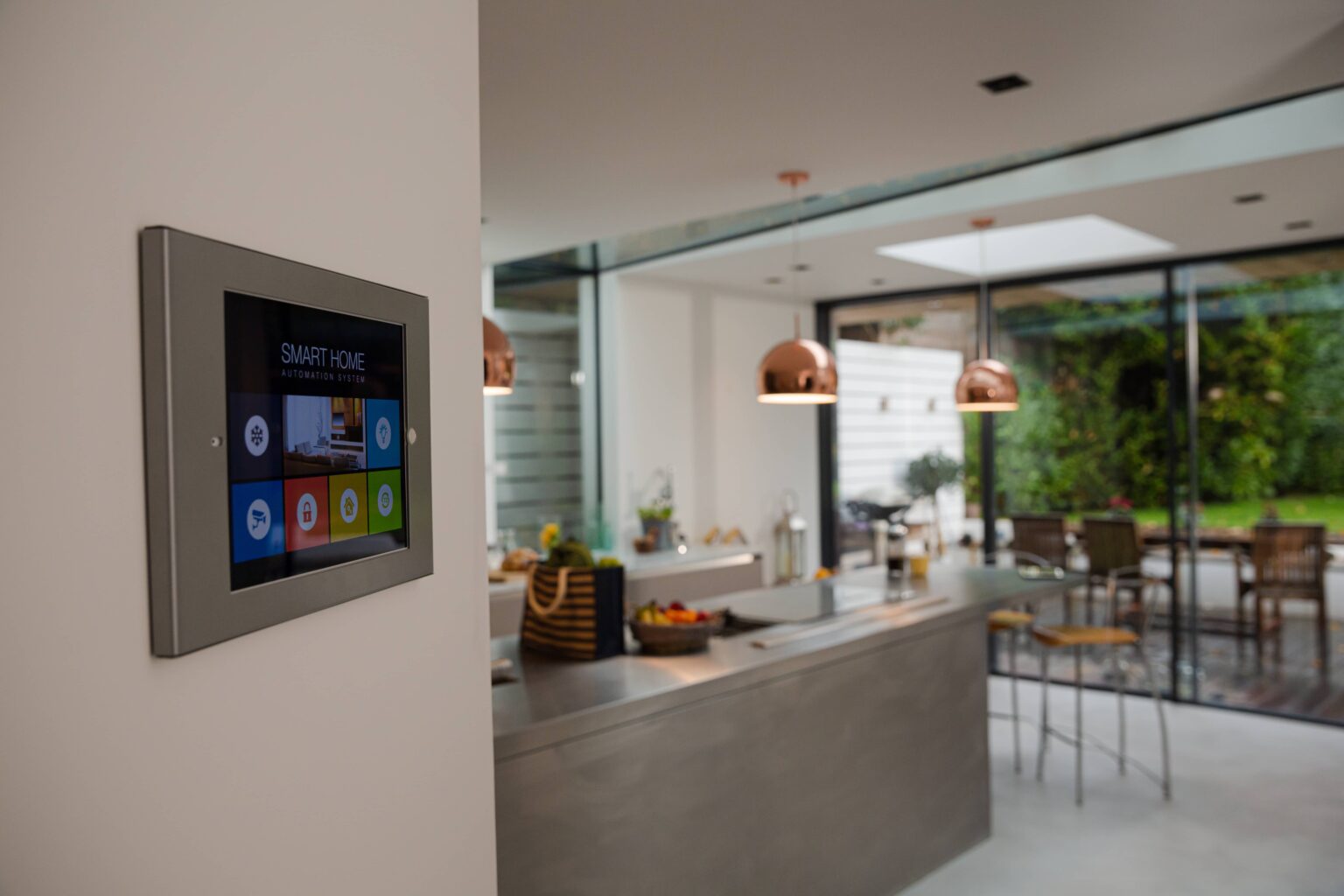 Smart home control panel in modern kitchen with home automation system