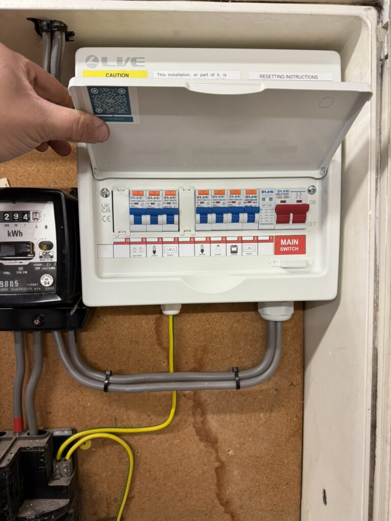 Professional electrician carrying out a fuse box safety inspection and consumer unit upgrade in the UK by ElectricalPep